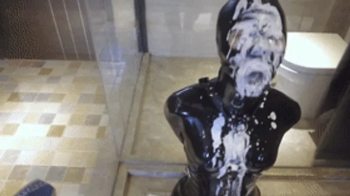 mz19 - Latex Clothing Restraining a Girl in the Bathroom.webp