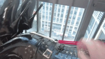 mz23 - A latex puppy strapped to a treadmill.webp