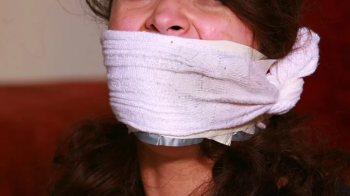 Dominic Wolfe's Gagged Beauties - Waitress Kitty Catherine Tightly Taped Up & Double Sock gagged & D.webp