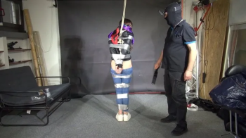 Shinynylonartsbound - Poor Marie bound and gagged in a shiny nylon Windbreaker.webp