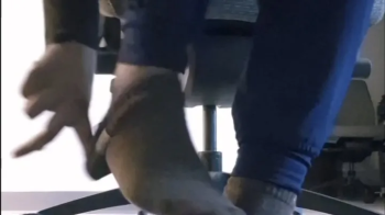 Caught at Work- Barefoot Tease Under the Desk.webp