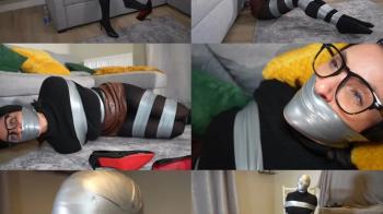 Sarah wild and her big tape bondage escape challenge- tape bound, gagged and tape hooded (mp4).webp